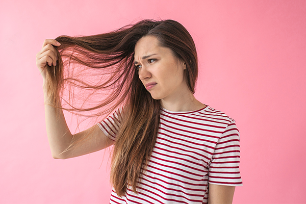 why hair looks greasy after a hair wash?