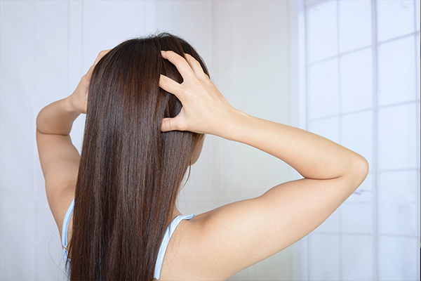 how does scalp massage promote hair growth?