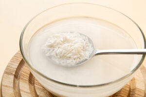 do you put rice water on wet or dry hair?