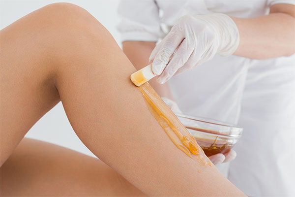 does waxing reduce hair growth?